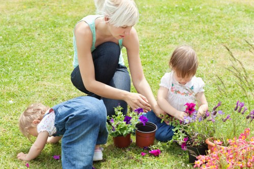 Community volunteers exchanging plants and reusable gardening materials